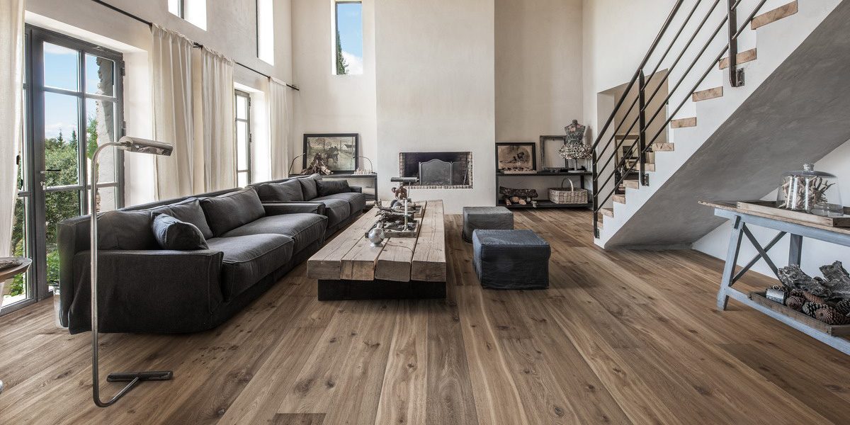 Wide-plank hardwood flooring in a renovated room